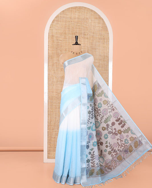 Cream and Blue Linen Cotton Saree, Beautified with Ombre-Style Double-Color Print, Highlighted by Contrast Zari Bavanji Border, Pallu Pictures Floral Prints, and Paired with a Floral Printed Blouse