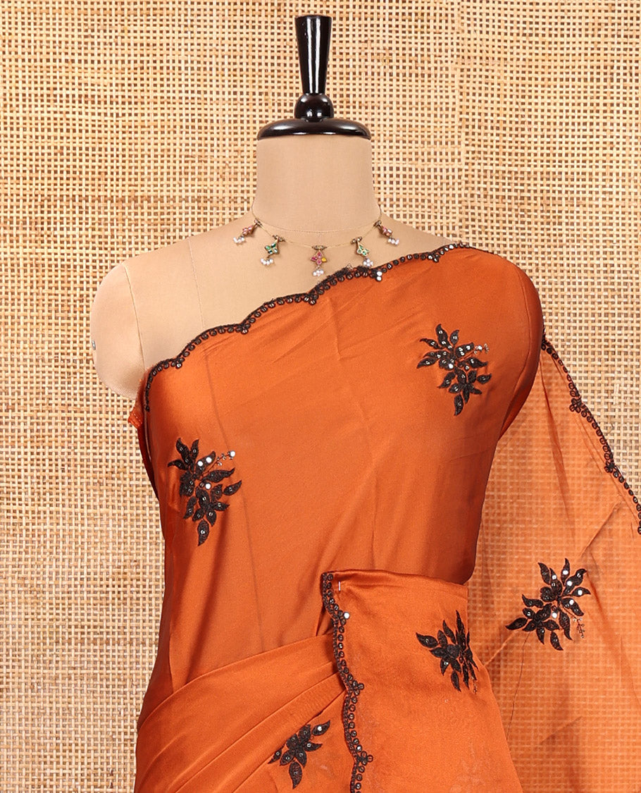 Rust Orange Rangoli Chiffon Saree, Finely Crafted with Floral Embroidery Motifs on Its Body, Scallop Embroidered Border, Embroidered Pallu, and Paired with a Contrast Blouse
