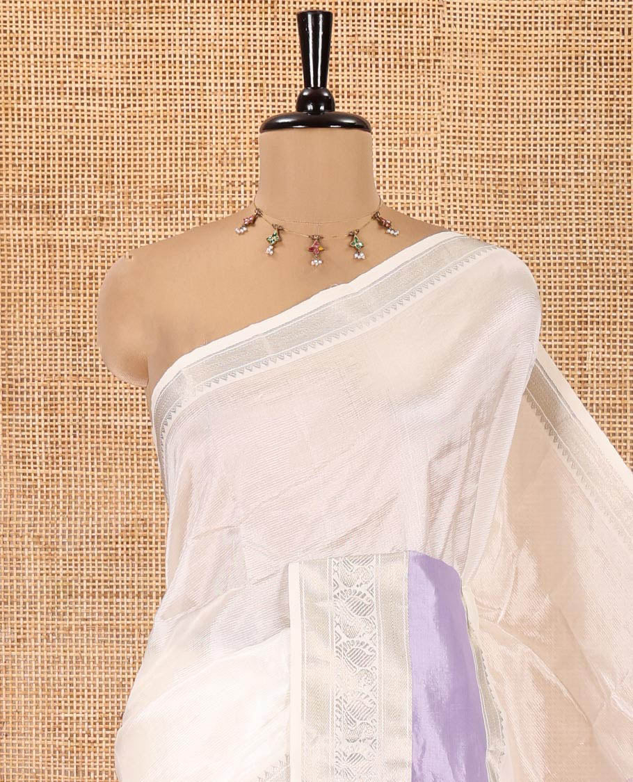 Off-White and Lavender Mangalagiri Silk Saree, Sparsely Woven Stripes on Its Body, Complemented by Contrast Border of Temple and Peacock Designs, Striped Pallu, and Paired with a Contrast Blouse