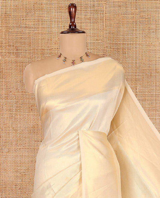 Gold Elite Soft Silk Saree, Gleamed Up with Zari Buttas and Stripes, Highlighted by a Zari Border, Zari-Striped Pallu, and a Matching Blouse