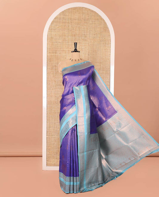 Blue Litchi Saree, Finely Crafted with Floral Zari Buttas and Zari Checks on Its Body, Complemented by a Contrast Traditional Zari Design Border, Gracefully Embellished Pallu, and Paired with a Contrast Blouse