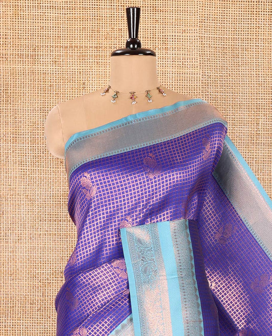 Blue Litchi Saree, Finely Crafted with Floral Zari Buttas and Zari Checks on Its Body, Complemented by a Contrast Traditional Zari Design Border, Gracefully Embellished Pallu, and Paired with a Contrast Blouse