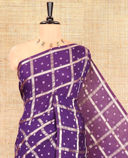 Borderless Purple Assam Silk Saree, Richly Detailed with Bandhani-Dotted Ghar Chola Design on Its Body, Gleaming Zari Pallu, and Paired with a Matching Blouse