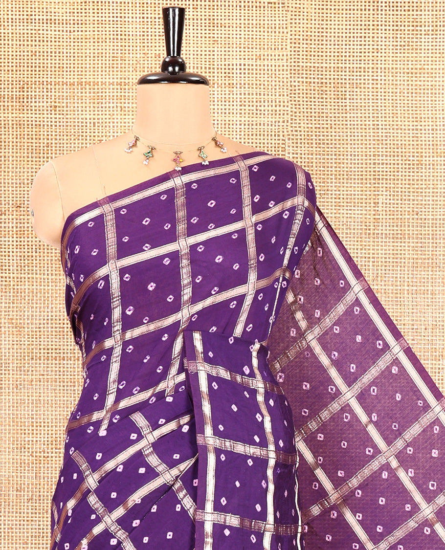 Borderless Purple Assam Silk Saree, Richly Detailed with Bandhani-Dotted Ghar Chola Design on Its Body, Gleaming Zari Pallu, and Paired with a Matching Blouse