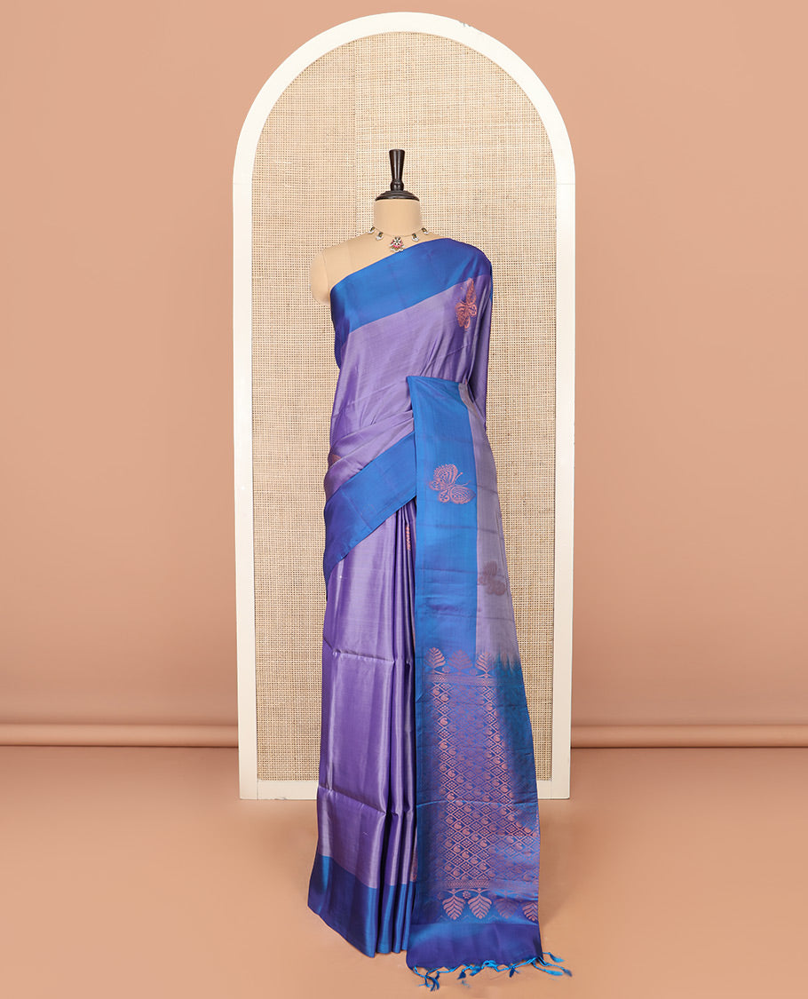 Lavender Semi Uppada Saree Mesmerized with Butterfly Zari Buttas, Complemented by a Contrast Butterfly Motifs Woven Border, Elegantly Framed Pallu of Jaal Designs, and Paired with a Contrast Blouse