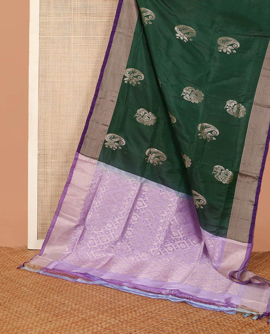 Deep green zari buttas Uppada saree, contrast bavanji border, and jaal patterned pallu