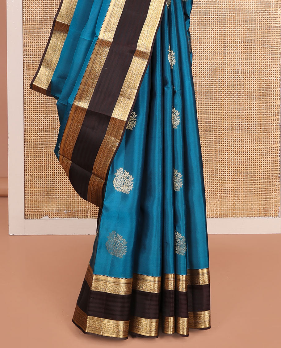 Blue Vasundhara Lite-Silk Mix Saree, Ornamented with Zari Buttas, Complemented by a Contrast Border of Traditional Zari Designs, Grand Pallu of Thilakam Patterns, and Paired with a Contrast Blouse