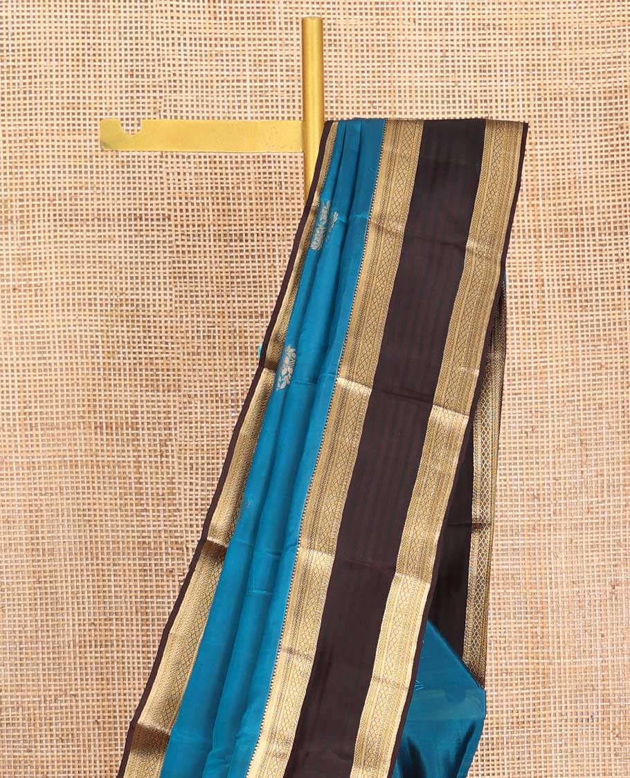 Blue Vasundhara Lite-Silk Mix Saree, Ornamented with Zari Buttas, Complemented by a Contrast Border of Traditional Zari Designs, Grand Pallu of Thilakam Patterns, and Paired with a Contrast Blouse