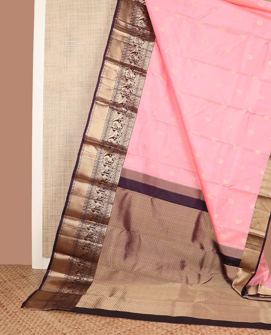 Pink zari buttas silk saree, contrast border of rudraksham, neli and mayil designs, and jaal pallu