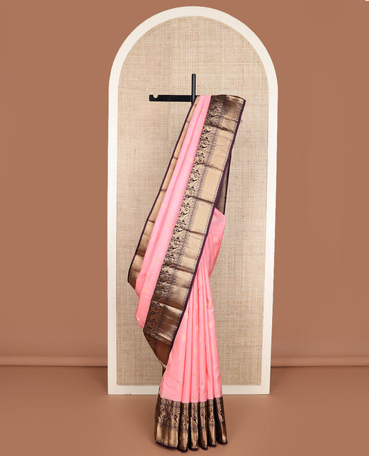 Pink zari buttas silk saree, contrast border of rudraksham, neli and mayil designs, and jaal pallu