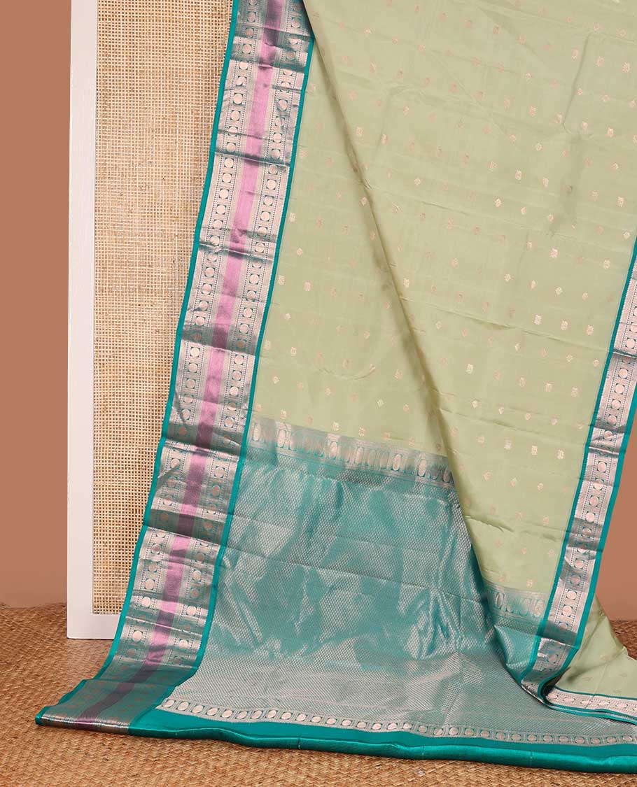 Green zari buttas silk saree, contrast border of rekku, kathir, poun, and mayil kann, and jaal pallu