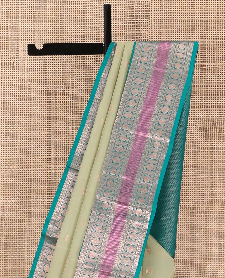 Green zari buttas silk saree, contrast border of rekku, kathir, poun, and mayil kann, and jaal pallu
