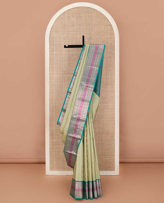 Green zari buttas silk saree, contrast border of rekku, kathir, poun, and mayil kann, and jaal pallu