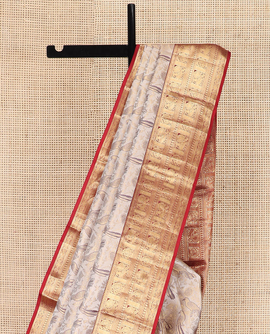 Cream Kanchipuram Silk Saree Artfully Woven with Bird Jacquard Design, Complemented by Contrast Border of Rekku, Mayil, Arumbu Manga, and Chakram Designs, Elegantly Highlighted Pallu of Geometric Patterns, and Paired with a Contrast Blouse