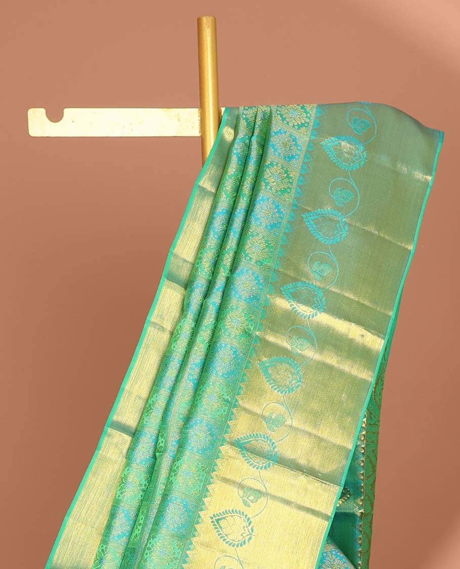 Green floral enclosed checked kancheepuram silk saree with self zari design border & floral zari design pallu