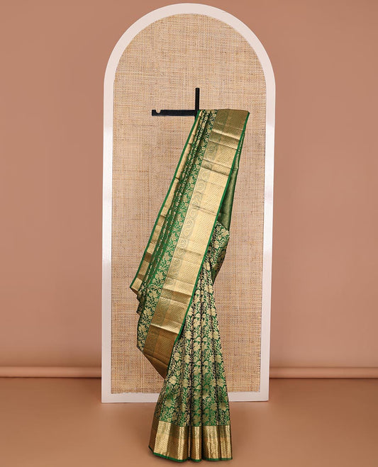 Green jacquard kanchipuram wedding silk saree, zari border of geometric patterns & jaal pallu