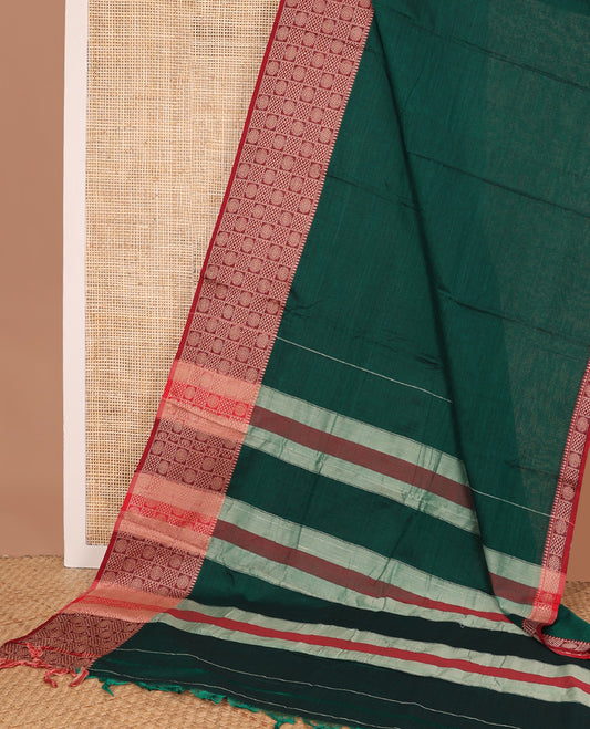 Green plain Narayanapet cotton saree, contrast temple border of buttas enclosed checks, and striped pallu