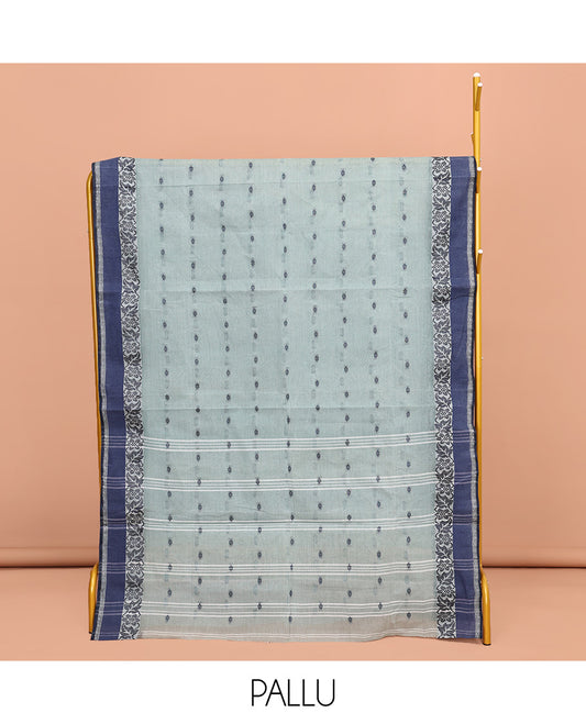 Grey Bengal Cotton Saree, Delicately Woven with Buttas All Over Its Body, Complemented by a Contrast Floral Creeper Design Border, Pallu of Stripes, and Paired with a Matching Blouse