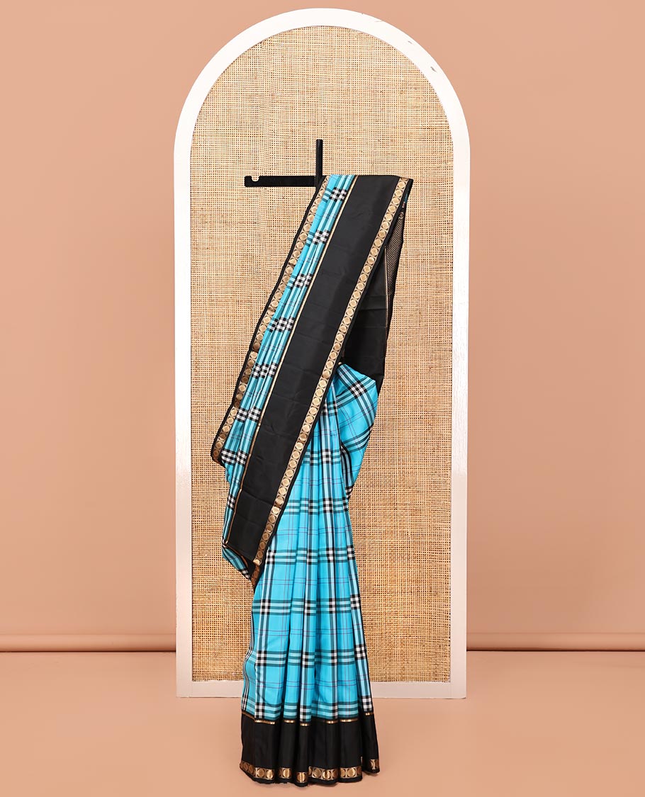 Blue-Black Vasundhara Lite Silkmix Saree Features Checks, Contrast Rettai Pettu Rekku-Poun Border, Zari-Striped Pallu, and a Contrast Blouse