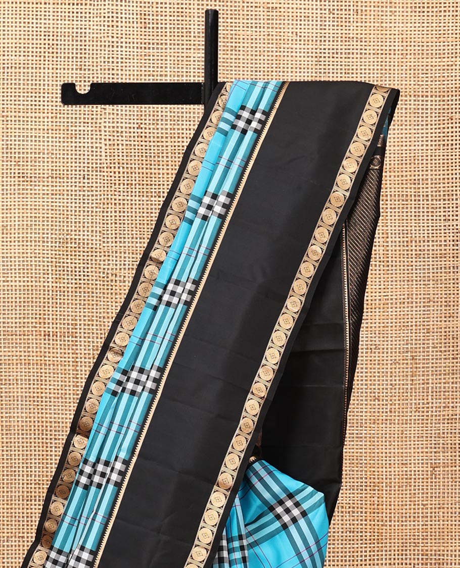 Blue-Black Vasundhara Lite Silkmix Saree Features Checks, Contrast Rettai Pettu Rekku-Poun Border, Zari-Striped Pallu, and a Contrast Blouse