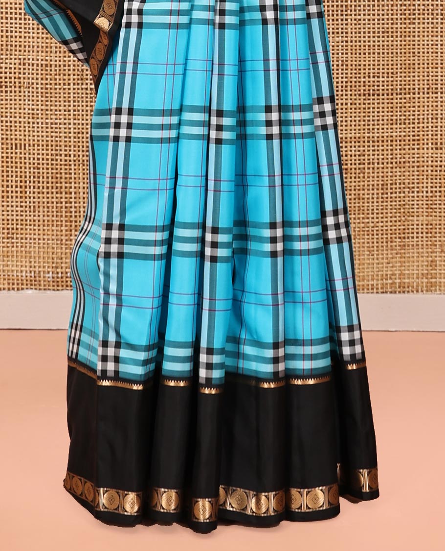 Blue-Black Vasundhara Lite Silkmix Saree Features Checks, Contrast Rettai Pettu Rekku-Poun Border, Zari-Striped Pallu, and a Contrast Blouse