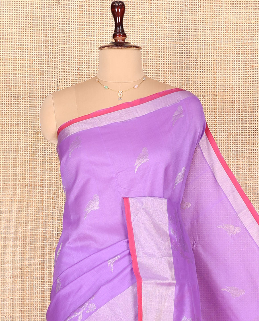 Lavender Kuppadam Cotton Saree, Subtly Sparkled with Bird Buttas All Over Its Body, Complemented by Bavanji Border, Contrast Pallu of Ogee Patterns, and Paired with a Contrast Blouse