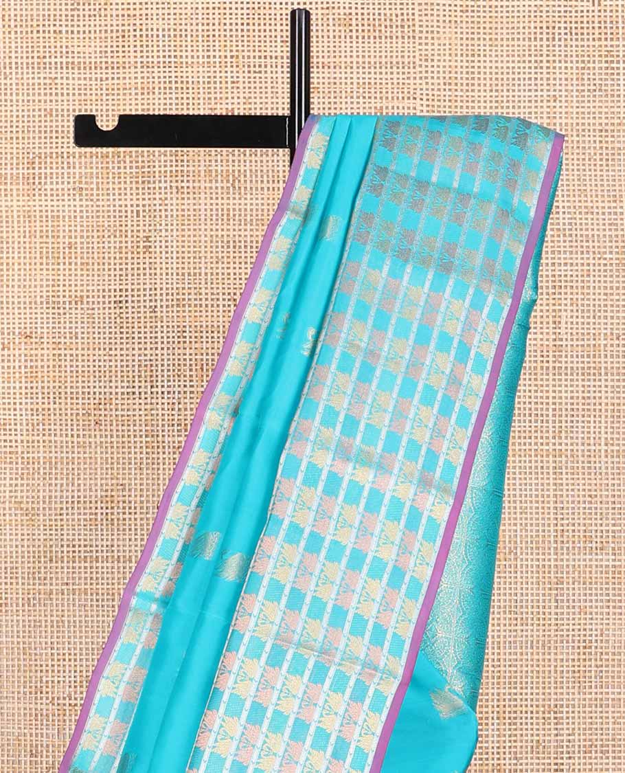light blue swan buttas vasundhara elite silk saree with self swan design border & floral design pallu
