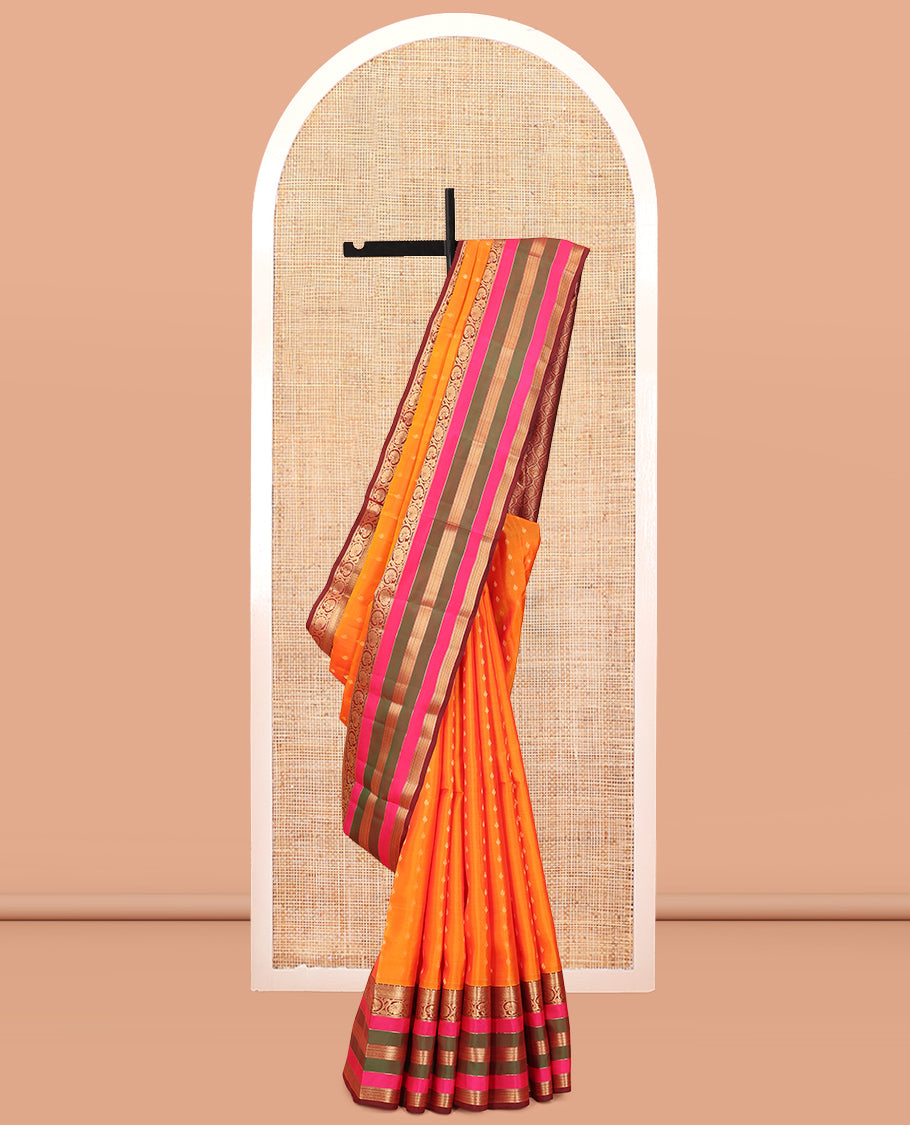 Orange Vasundhara Lite Silk Mix Saree, Accentuated with Zari Buttas, a Contrast Border of Jaal, Kodi Visiry and, Neli Designs, Grand Jaal Pallu, and a Contrast Blouse