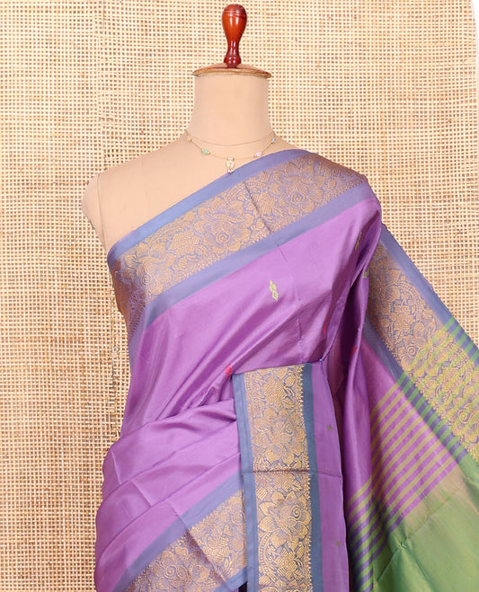 Purple Banana Pith Saree Bedecked with Resham Buttas, Complemented by a Contrast Floral Zari Design Border, Pallu Steeped with Stripes and Buttas, and Paired with a Contrast Blouse