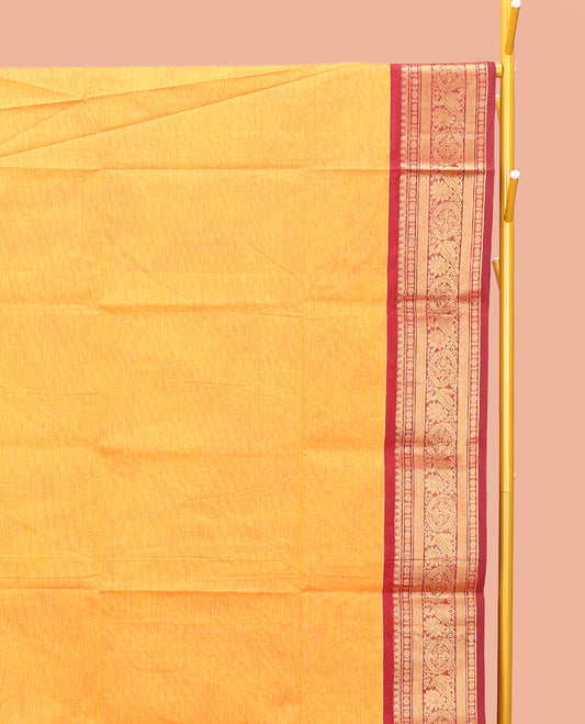 Orange Plain Chettinad Cotton Saree, Complemented by a Contrast Traditional Zari Design Woven Border, Subtle Pallu of Stripes, and Paired with a Matching Blouse
