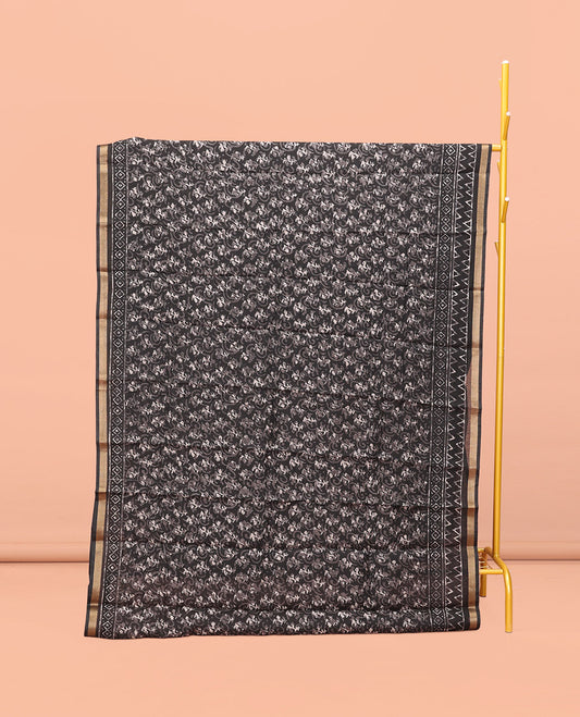 Black Kanchi Cotton Saree, Decked Up with Floral Print All Over Its Body, a Subtle Self-Border, Pallu of Block Printed Geometric Designs, and Paired with a Contrast Blouse