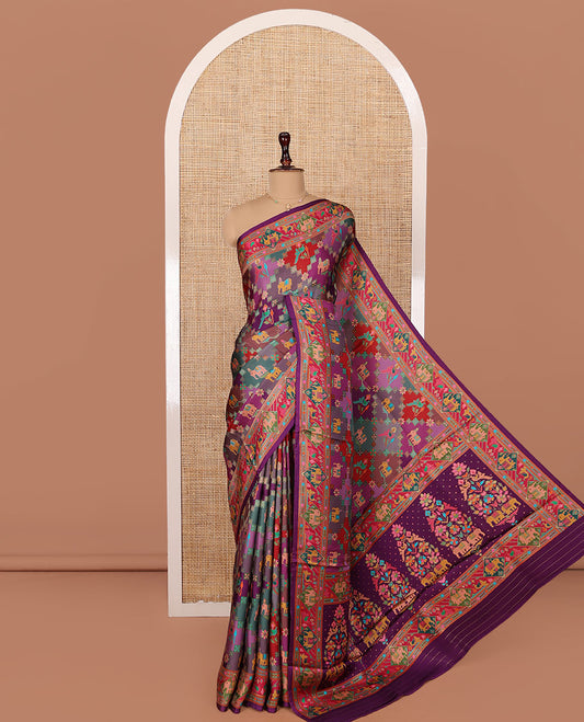 Multi-Color Dola Silk Saree, Artfully Designed with Kaleidoscope-Colored Patola Prints, Captivating Multi-Colored Printed Border, Multi-Colored Patola Printed Pallu, and Paired with a Matching Blouse