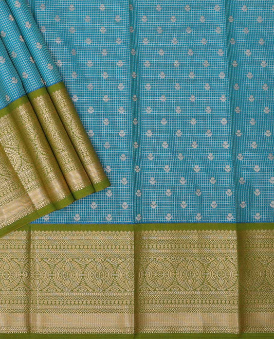 Blue checked, floral design art silk pavadai material with contrast zari design border & checked design blouse
