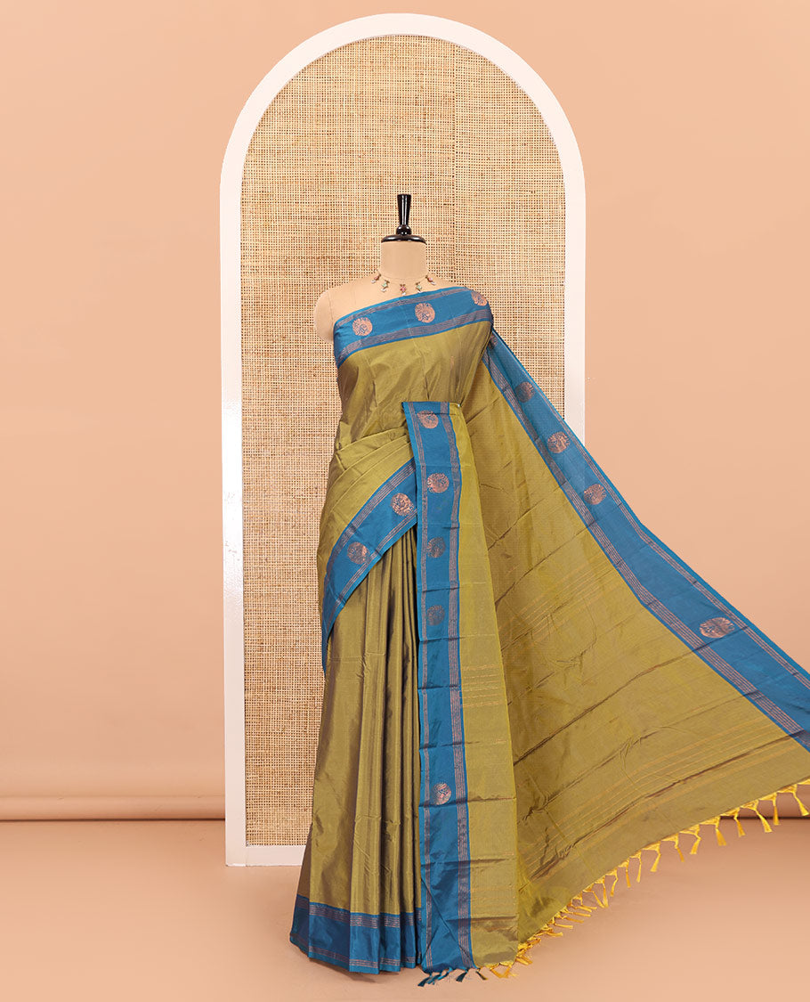 Mehendi zari buttas semi-soft silk saree, contrast peacock zari buttas and striped border, striped pallu, and a plain blouse