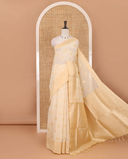 Cream gold zari thilakam motifs woven Tissue chanderi saree, gold zari bavanji border, plain pallu & brocade blouse