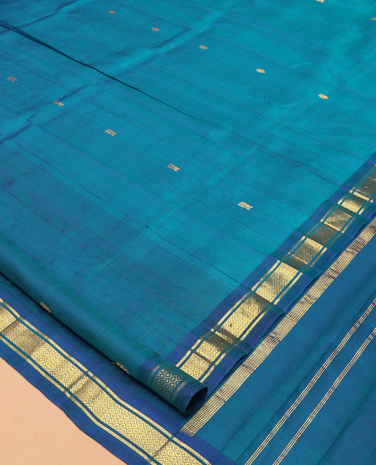 Blue Kanchipuram Silk Saree, Woven with Zari Buttas, Complemented by a Contrast Border of Banaras, and Mayil Kann Design, Zari Design Pallu, and No Blouse