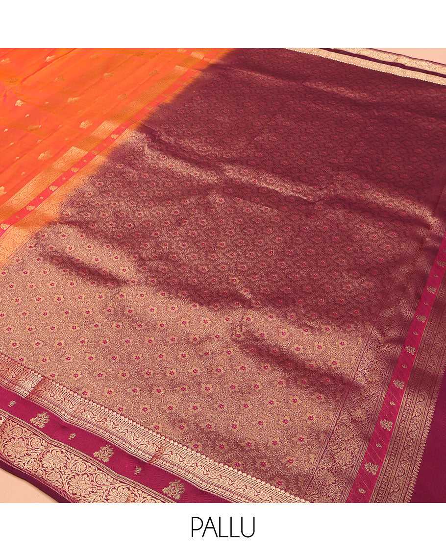 Orange Vasundhara Lite Silk Mix Saree, Accentuated with Zari Buttas, Complemented by a Contrast Border of Thilakam Mokku, and Kodi Visiry Designs, Pallu of Floral Jaal Designs, and Paired with a Contrast Blouse