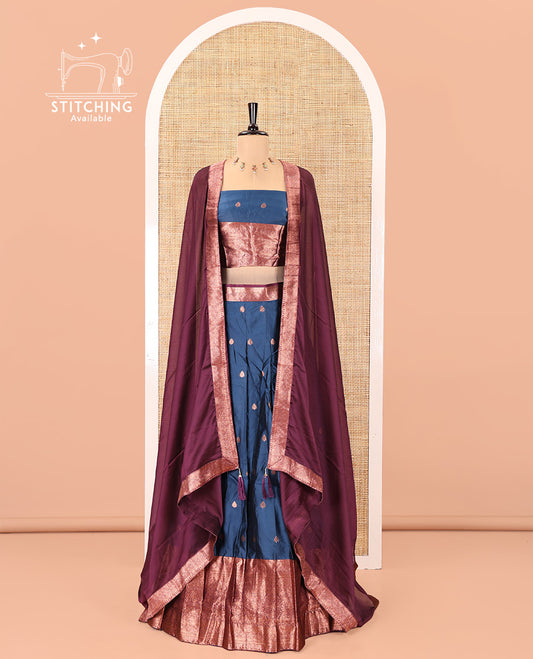 Blue-Magenta Semi-Banarasi Half-Saree Features Zari Buttas Skirt, a Contrast Traditional Zari Border, a Matching Blouse, and a Contrast Satin Georgette Dhavani