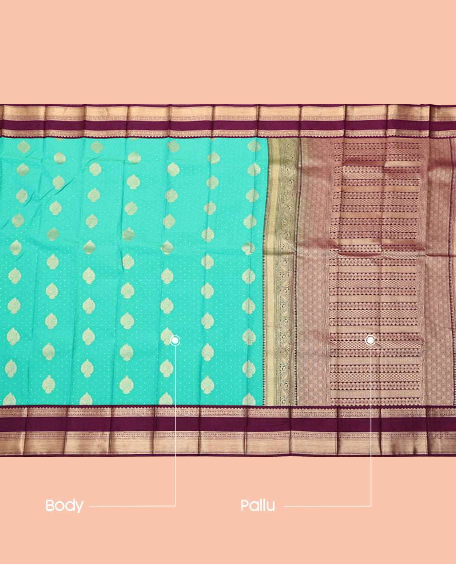 Turquoise Budget Silk Saree, Mesmerized with Zari Buttas, Complemented by a Contrast Traditional Zari Rettai Pettu Border, Grand Pallu, and a Contrast Blouse