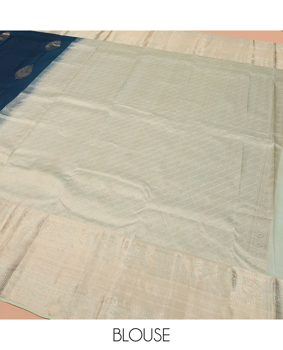 Blue Vasundhara Lite Silk Mix Saree, Elegantly Highlighted with Zari Buttas on Its Body, Complemented by a Contrast Zari Border of Banaras, Paisa, and Mayil Designs, Intricately Designed Pallu, and Paired with a Contrast Blouse