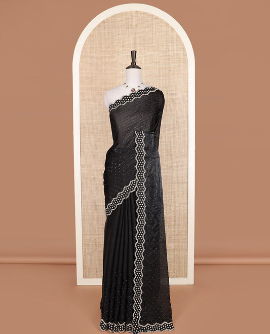 Black stone work designer saree, scallop floral motifs micro stone work border