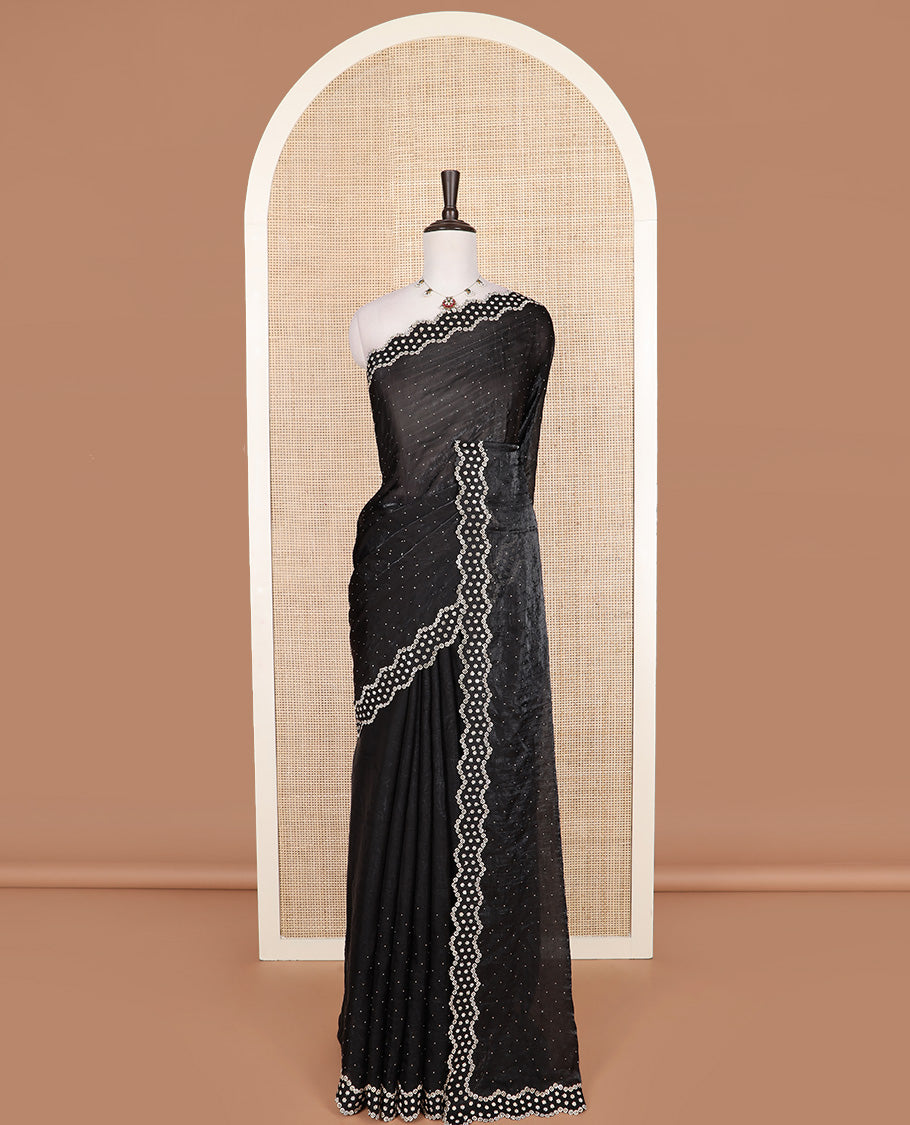 Black stone work designer saree, scallop floral motifs micro stone work border