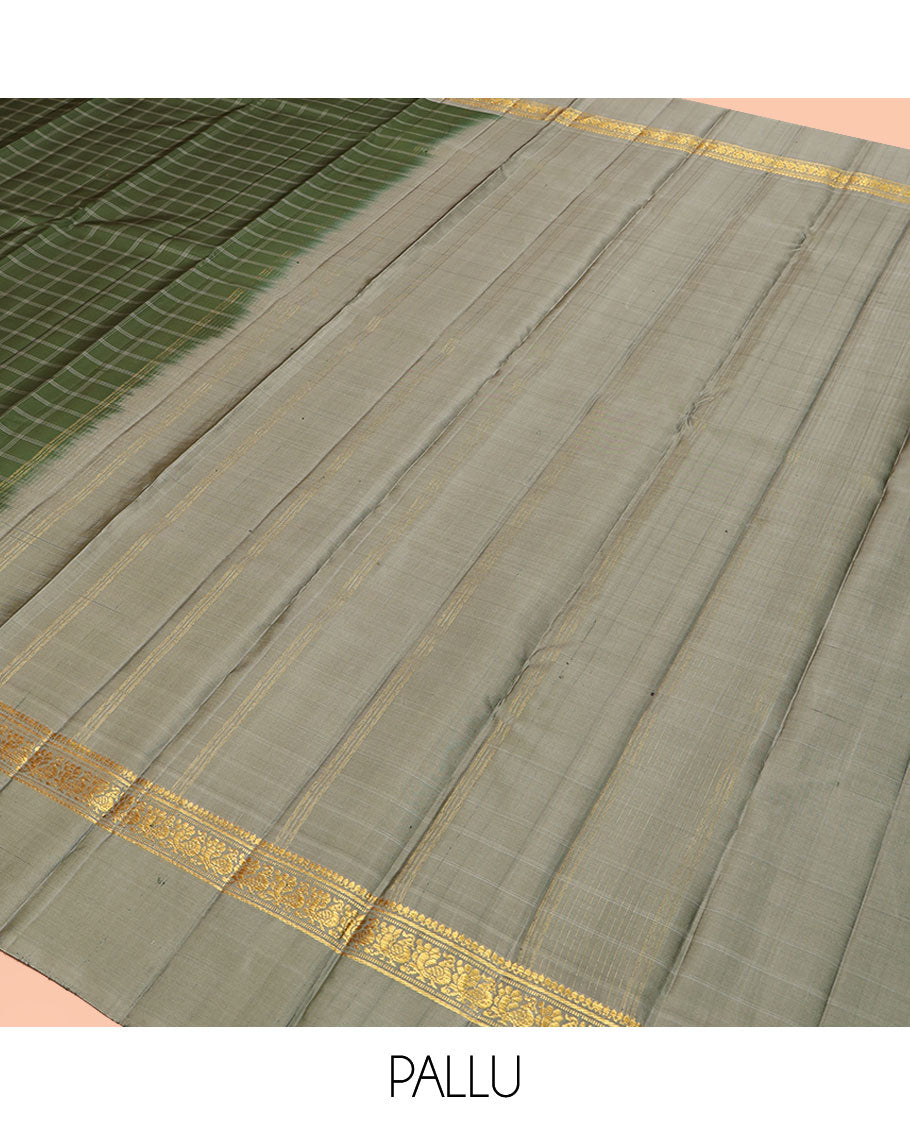 Olive Kanchipuram Silk Saree, Enthralled with Medium-Sized Checked Design All Over Its Body, Complemented by a Contrast Kal Eragina Border of Thilakam Mokku, Banaras, Muthu, and Mayil Designs, Subtly Striped Pallu, and Paired with a Contrast Blouse