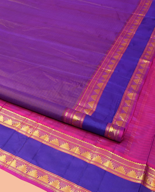 Brown Kanchipuram Silk Saree Adorned with Vazhaipoo Stripes, Complemented by a Contrast Rettai Pettu Border of Thilakam Mokku, Muthu, Neli, and Thazampoo Rekku Designs, Sparsely Woven Pallu, and Paired with a Contrast Blouse