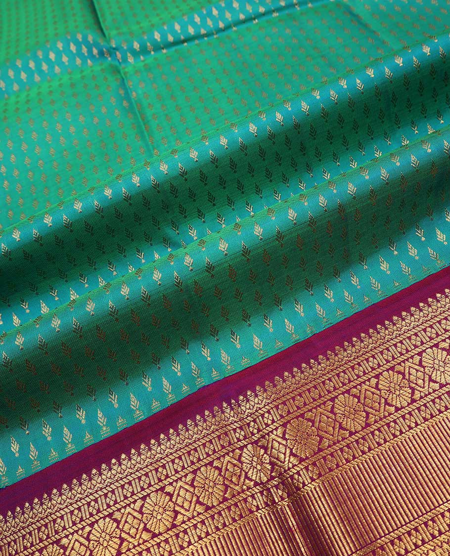 Blue puresilk halfsaree, zari buttas skirt, contrast border, blouse of thilakam mokku,banaras,kamalam, and lavangam designs, and intricate dhavani