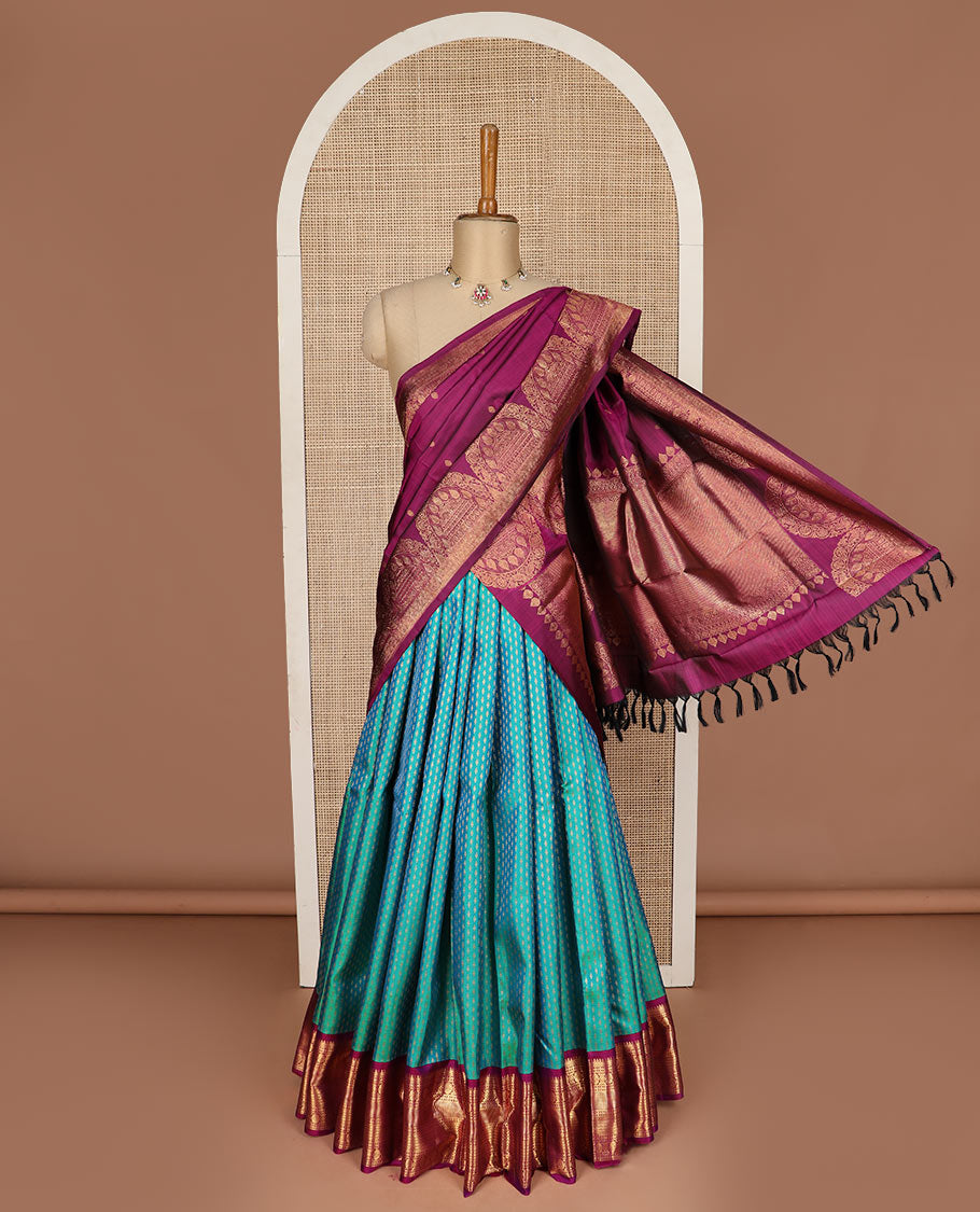 Blue puresilk halfsaree, zari buttas skirt, contrast border, blouse of thilakam mokku,banaras,kamalam, and lavangam designs, and intricate dhavani
