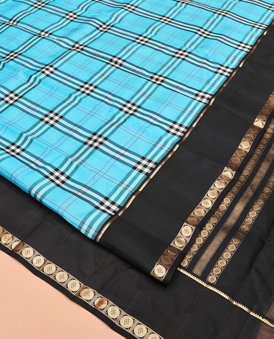 Blue-Black Vasundhara Lite Silkmix Saree Features Checks, Contrast Rettai Pettu Rekku-Poun Border, Zari-Striped Pallu, and a Contrast Blouse