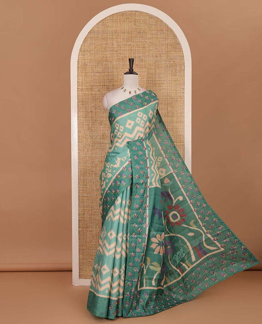 Green pochampally ikkat style geometric printed fancy tussar saree, contrast floral motifs thread embroidered border, ikkat printed pallu, and plain blouse