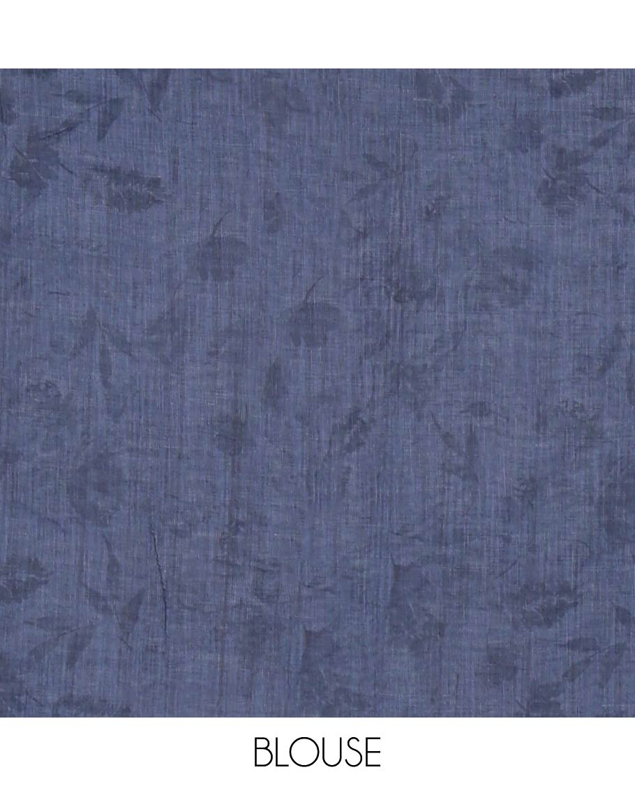 Grey Linen Cotton Saree, Depicts Flowers and Faces Printed on Its Body, Subtle Zari Piping Border, Pallu Mirrors the Self-Print, and Comes with a Contrast Blouse