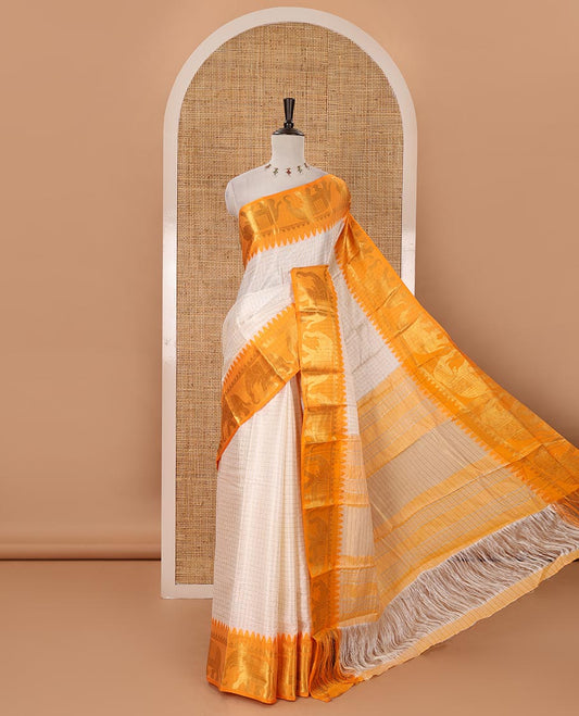 White checked semi-tafeta saree, contrast temple zari elephant motifs orange color border, zari-rich pallu & contrast checked zari border blouse